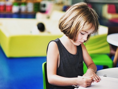 young girl drawing